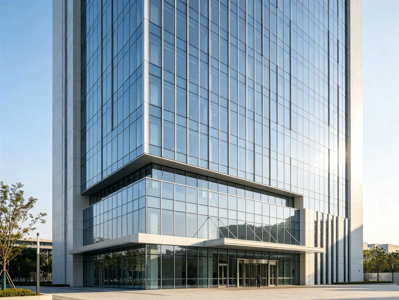 Commercial office building façade with modern aluminum window systems in urban environment